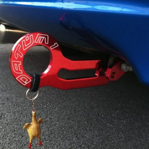 Red JDM tow hook (rear-mounted)