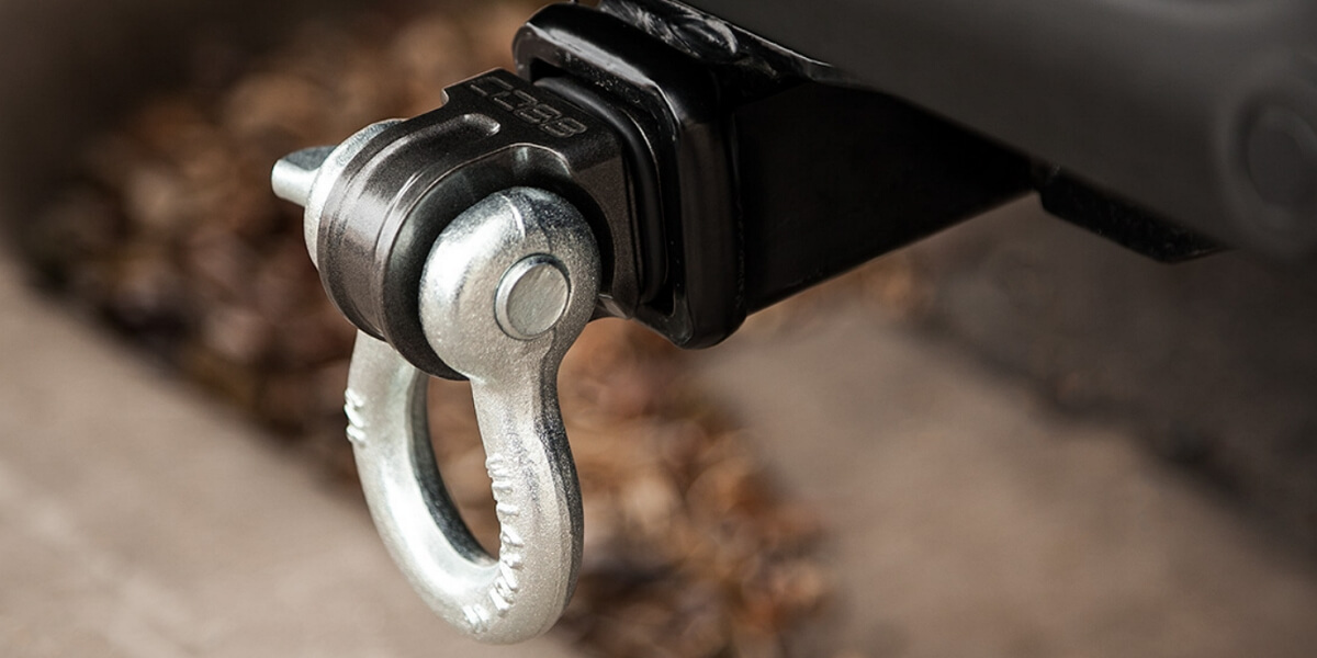 d ring shackle attached to a vehicle's hitch receiver